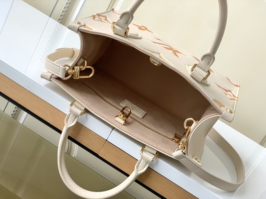 Сумка посыльного OnTheGo MM Louis Vuitton вензеля шафрана сливк гигантская для IPad мини