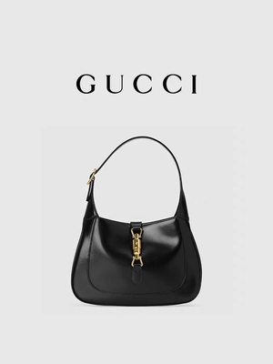 Черная кожаная сумка 1961 Джеки к время Gucci удостоила классических золотых аксессуаров