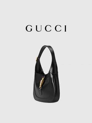 Черная кожаная сумка 1961 Джеки к время Gucci удостоила классических золотых аксессуаров