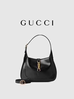 Черная кожаная сумка 1961 Джеки к время Gucci удостоила классических золотых аксессуаров