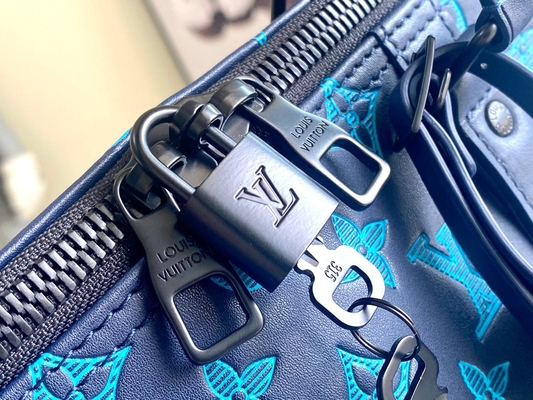 Сумки Keepall BANDOULIÈRE 50 голубые Бостон сумки больших заклеймленных людей