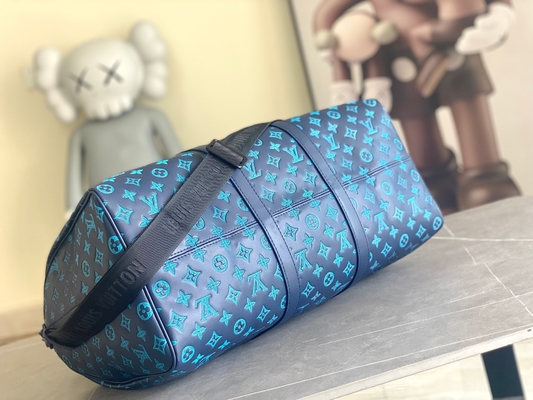 Сумки Keepall BANDOULIÈRE 50 голубые Бостон сумки больших заклеймленных людей