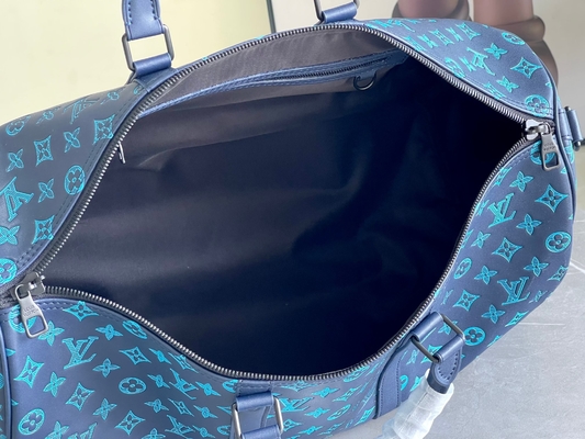Сумки Keepall BANDOULIÈRE 50 голубые Бостон сумки больших заклеймленных людей